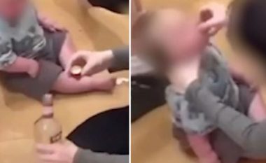 Publikuan videon ku i jepnin vodka foshnjës, arrestohet çifti në Britani (VIDEO)