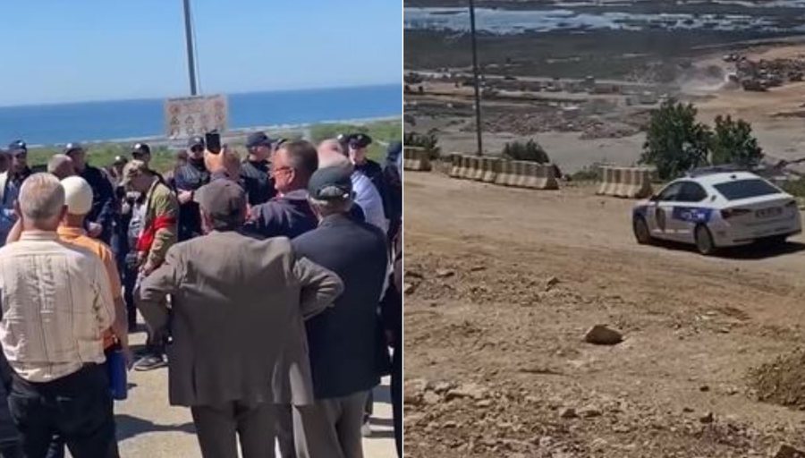 Qytetarë nga e mbarë Shqipëria zbarkuan sot në Rrjoll, dy makina policie që largohen në mes të protestës