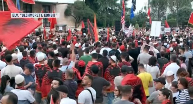 Protest against the Government  emigrant  We were united by the magic words  Rama in prison  Berisha in prison 